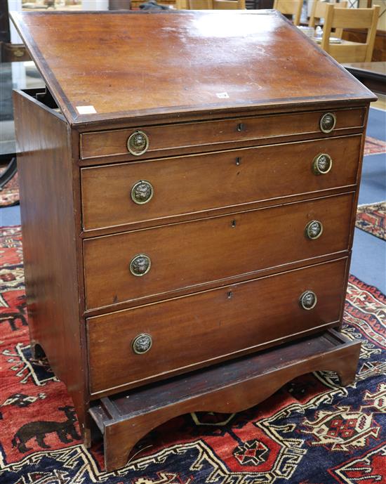 A George III mahogany draughtmans chest of four drawers	 W.93cm